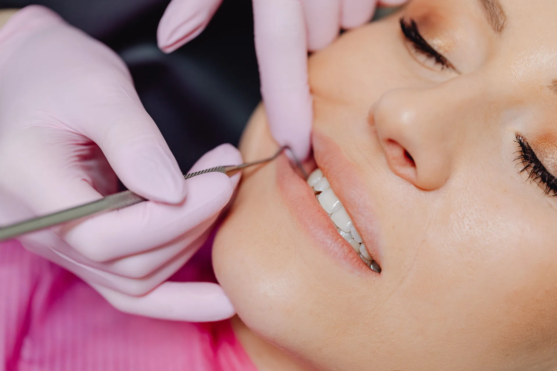 Patient receiving a preventative dental examination at Plaza Dental Arts