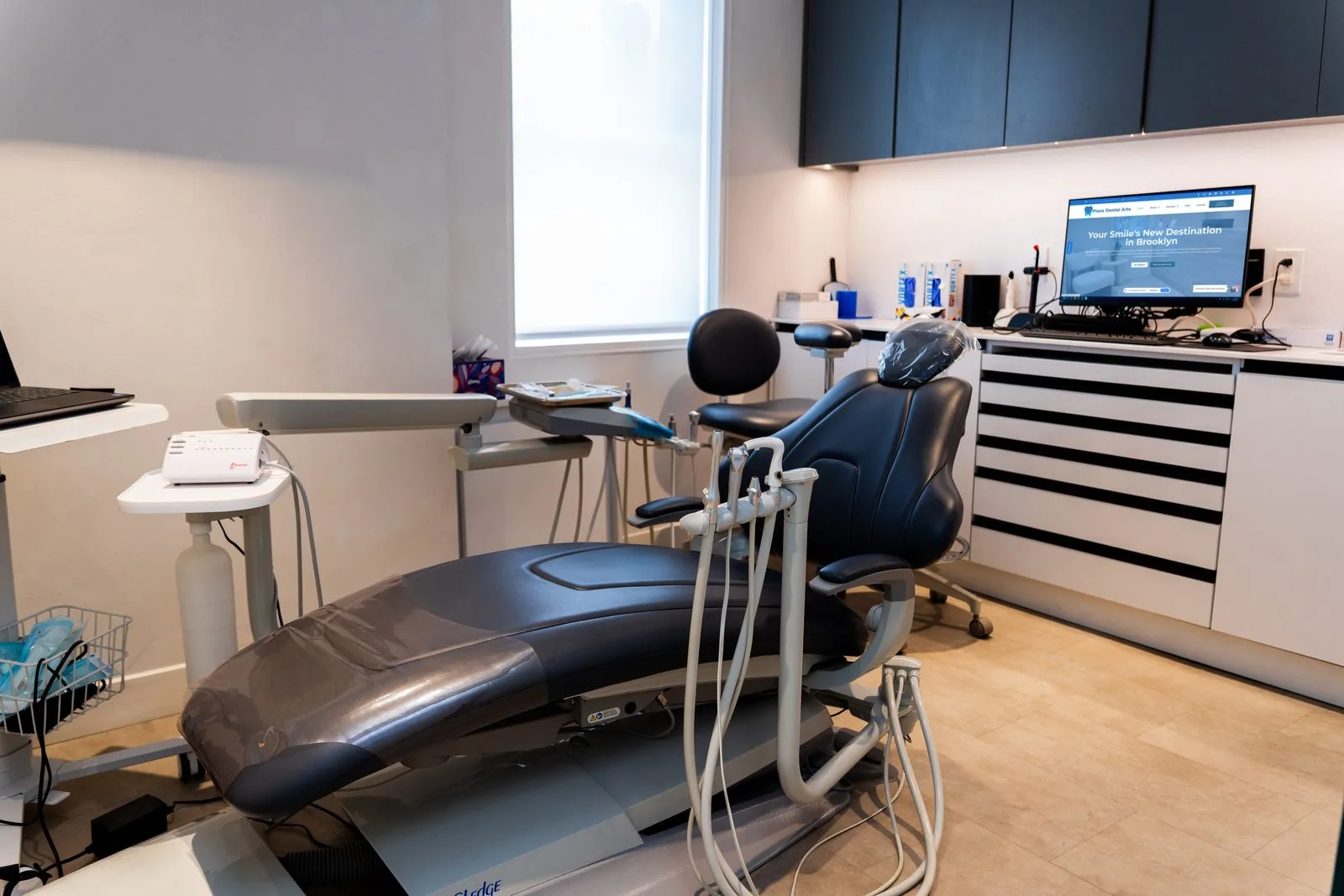 A bright dental treatment room at Plaza Dental Arts