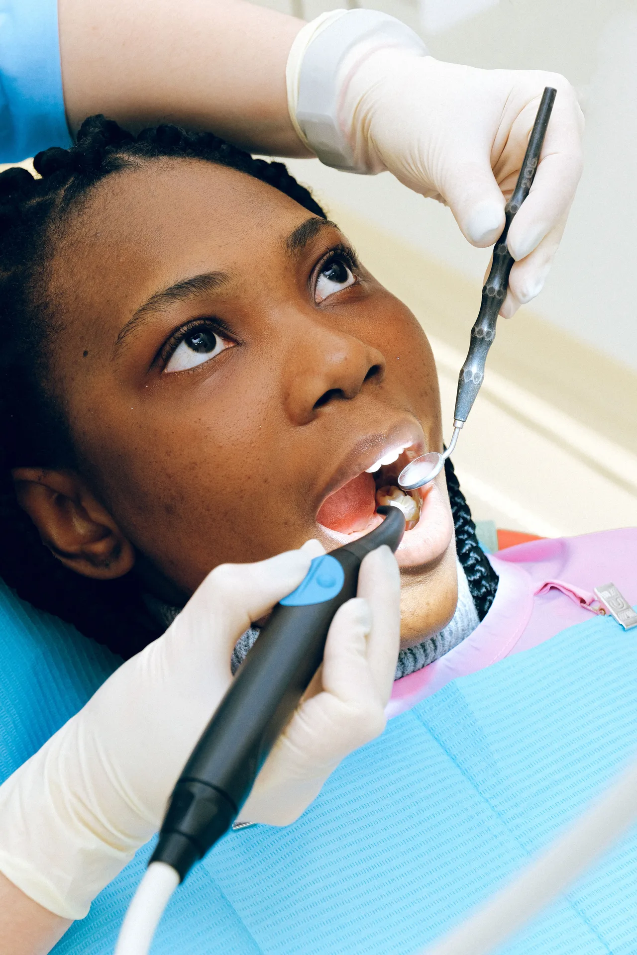 Patient receiving emergency dental treatment at Plaza Dental Arts
